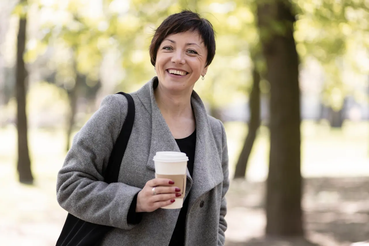 happy-middle-aged-woman-walking Large